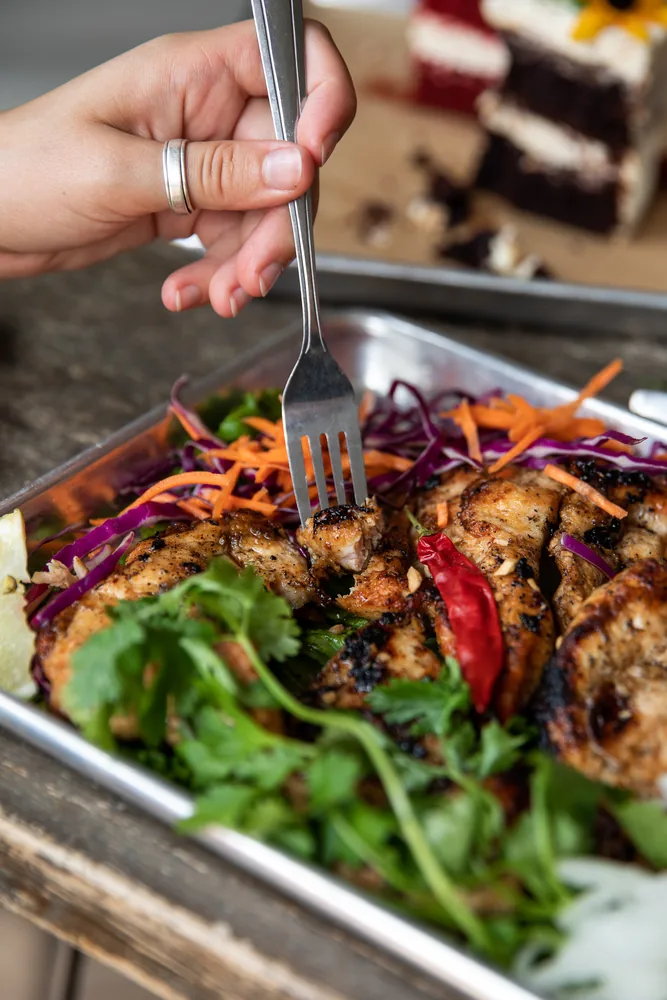 Forkful of grilled Thai chicken
