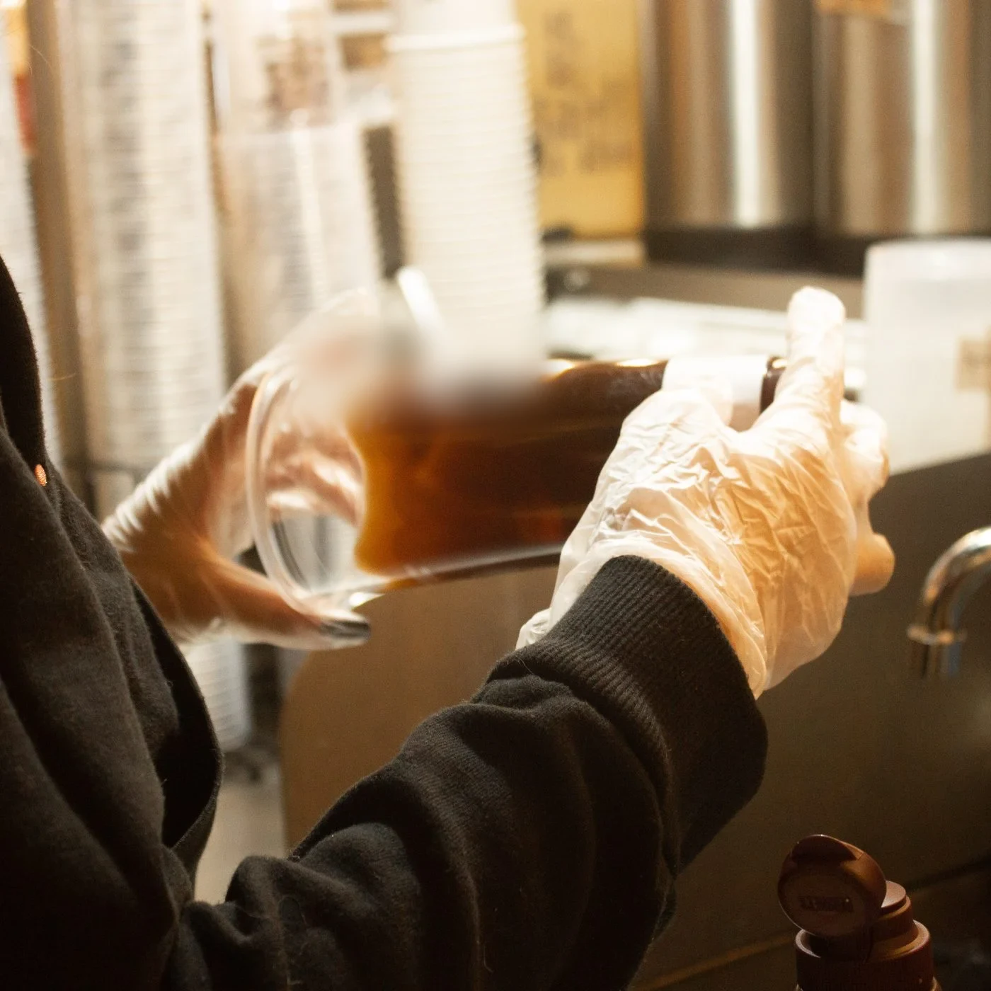 Staff preparing fresh boba tea at Amber Hour Tea Co.