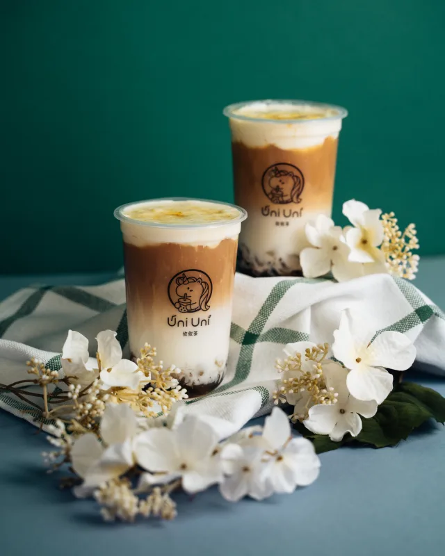 Pu'er Tea Latte with Crystal Boba & Caramel Cheese Foam