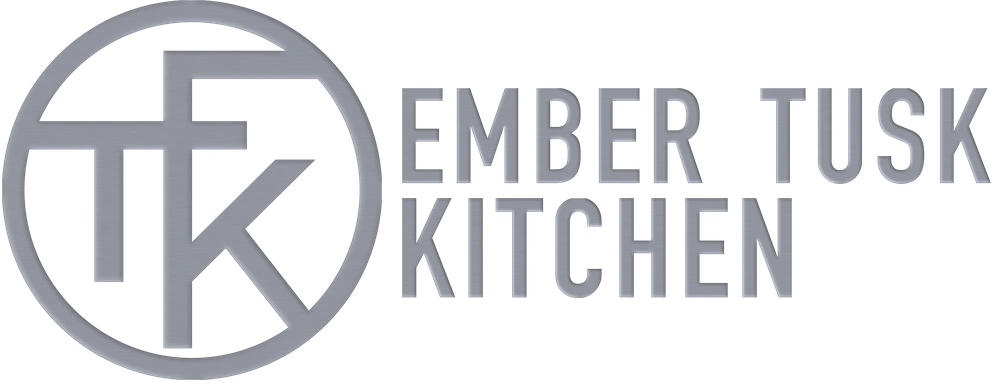 Ember Tusk Kitchen — chrome ETK monogram and wordmark.