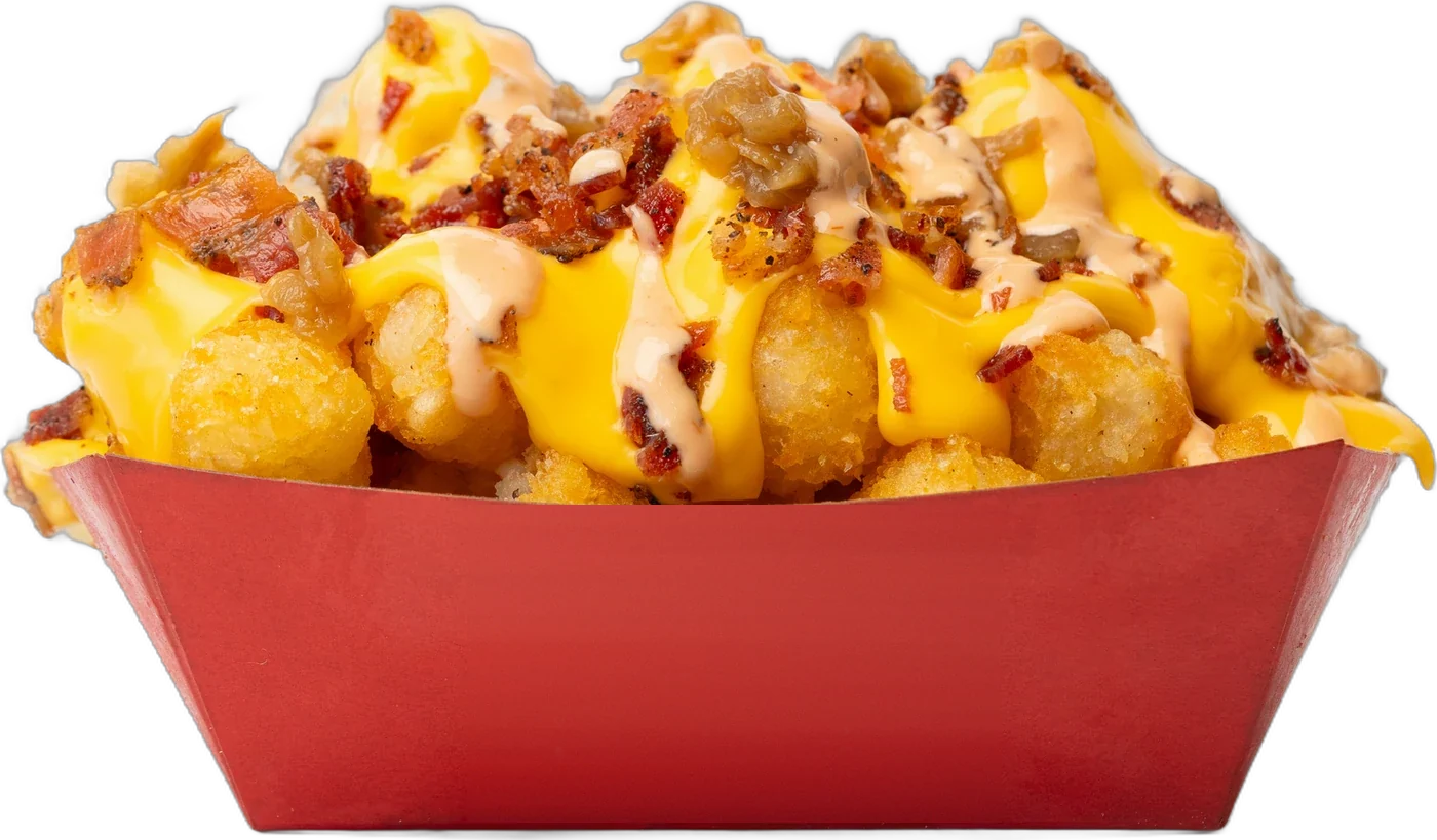 Loaded tater tots with cheese sauce, bacon and caramelized onion