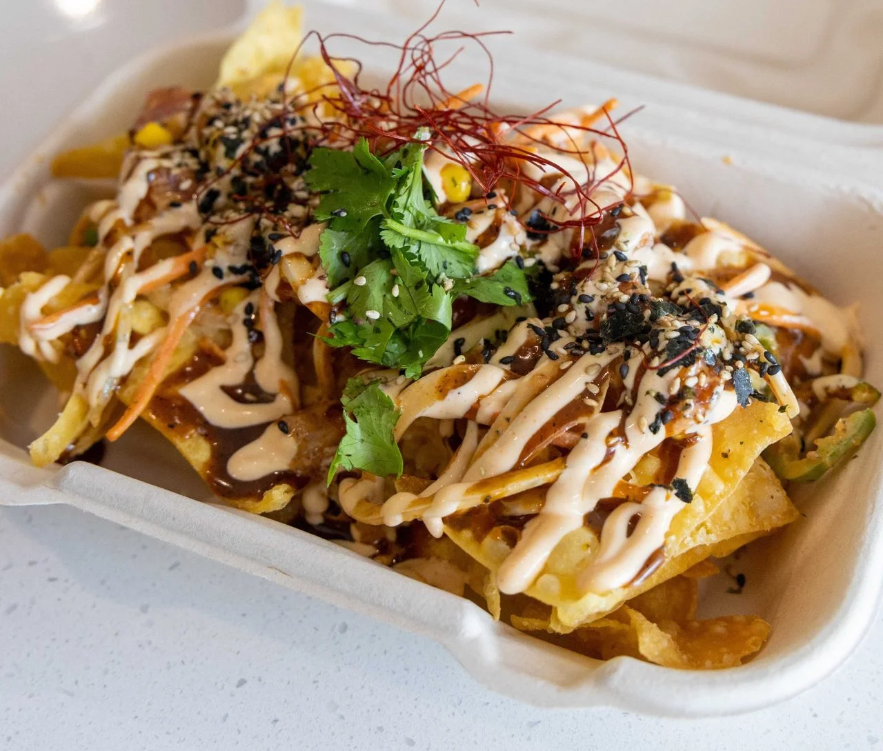 Poke nachos with spicy mayo and furikake